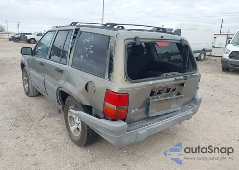 1997 Jeep Grand Cherokee Laredo/Tsi из США, поврежденный, VIN 1J4FX58S1VC735403